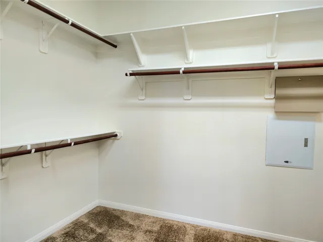 a view of small space with racks on the wall