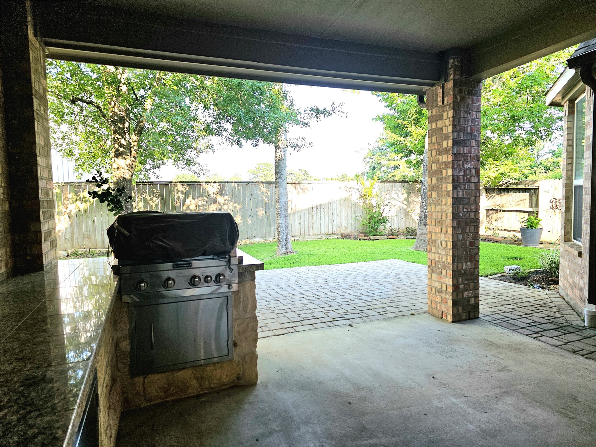 22106 Flashing Ridge Spring, TX 77389 - Photo 36 of 44 a living room with fireplace and a floor to ceiling window