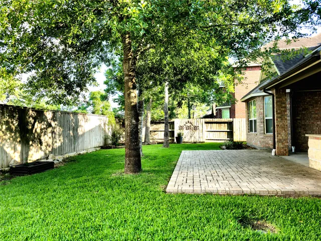 a view of a backyard with a garden