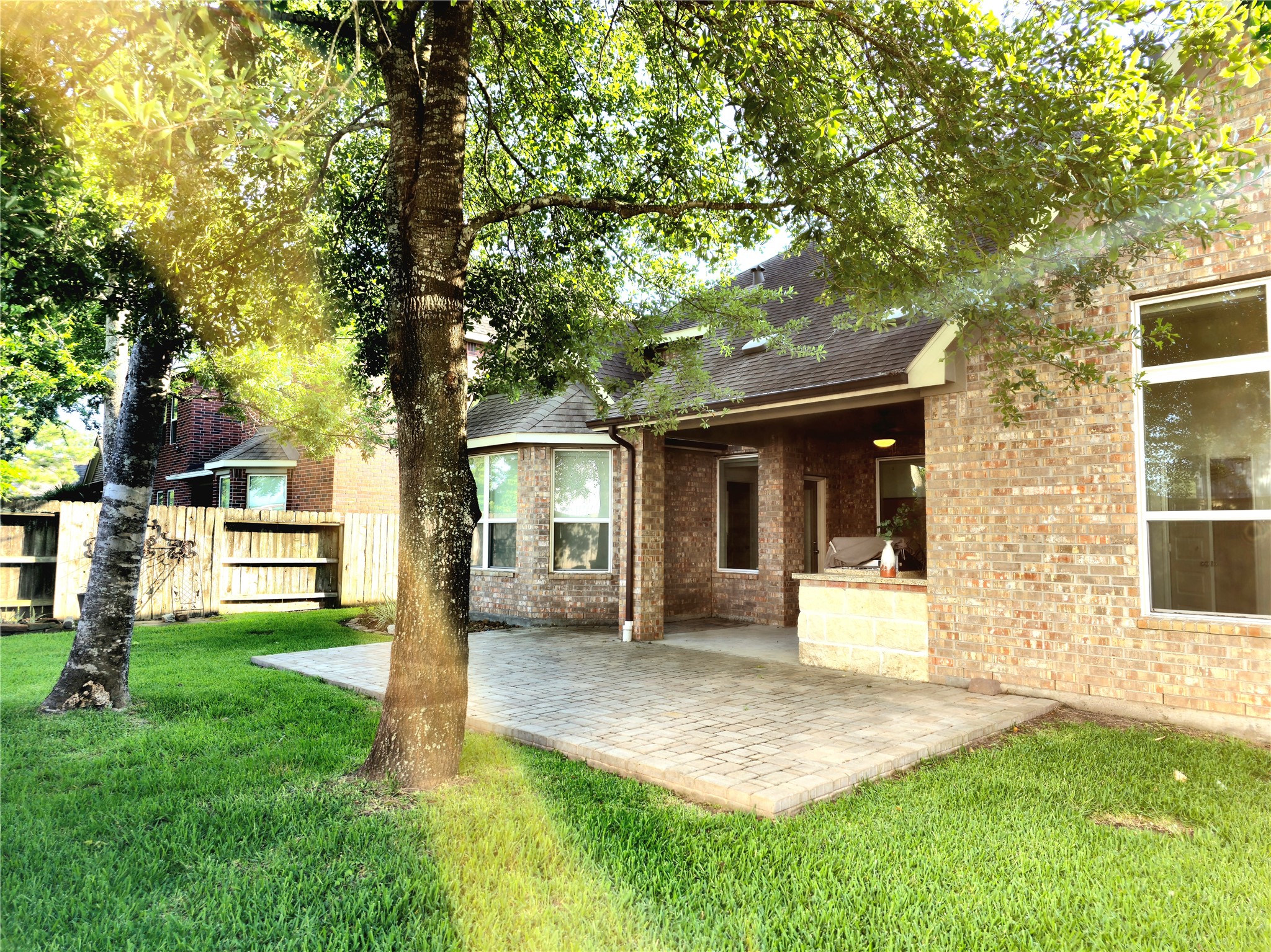 22106 Flashing Ridge Spring, TX 77389 - Photo 38 of 44 a front view of a house with a yard and trees
