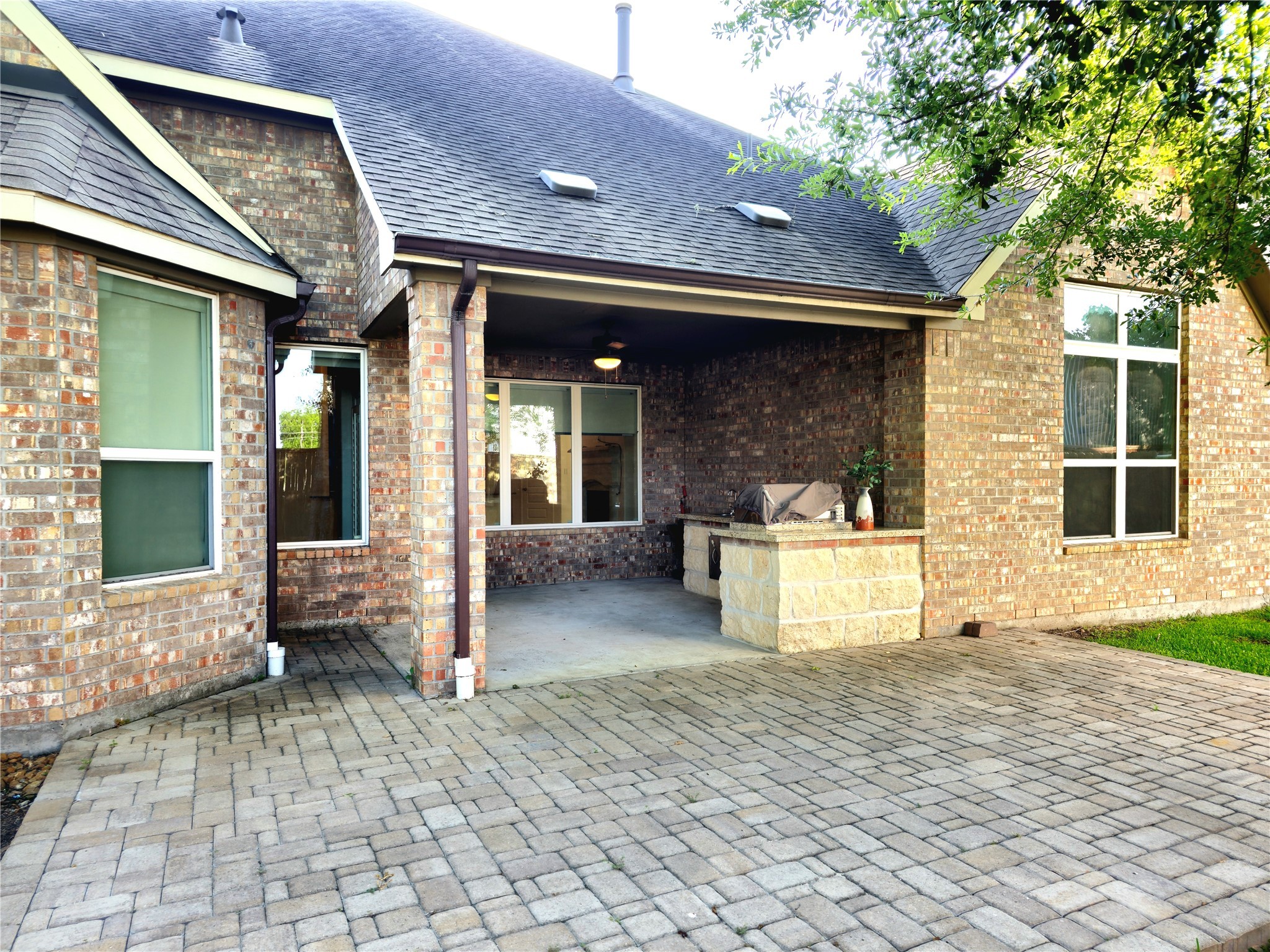 22106 Flashing Ridge Spring, TX 77389 - Photo 39 of 44 a view of a patio with table and chairs