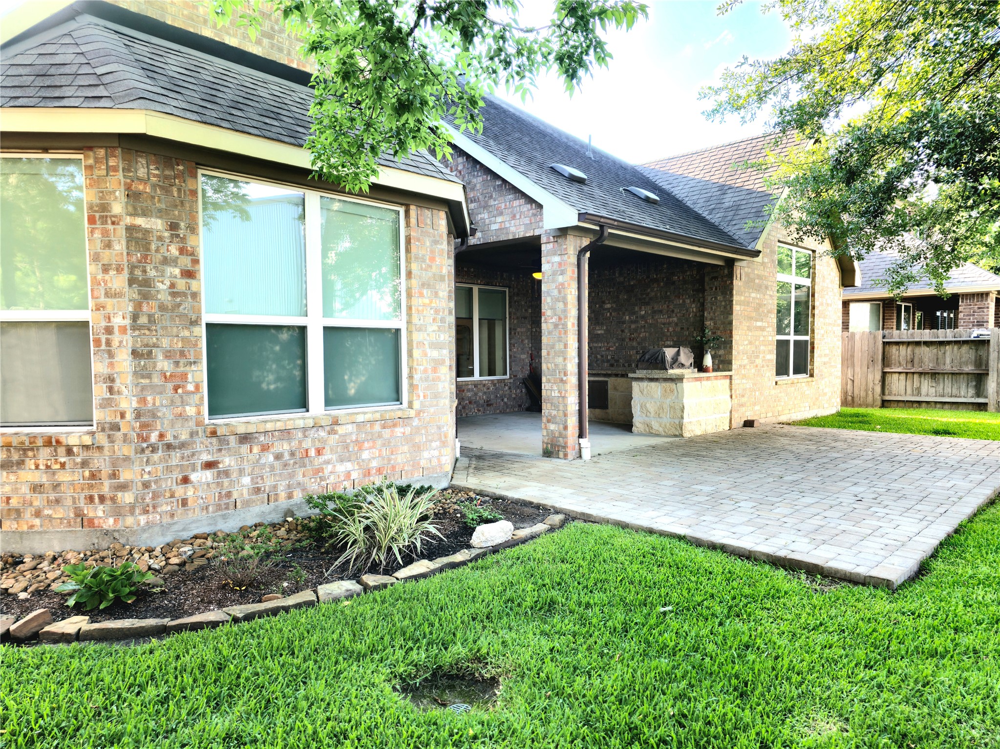 22106 Flashing Ridge Spring, TX 77389 - Photo 40 of 44 a front view of a house with garden