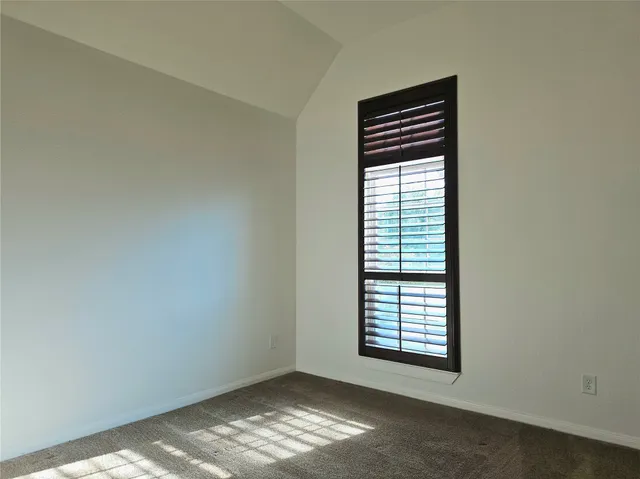 a view of empty room with window