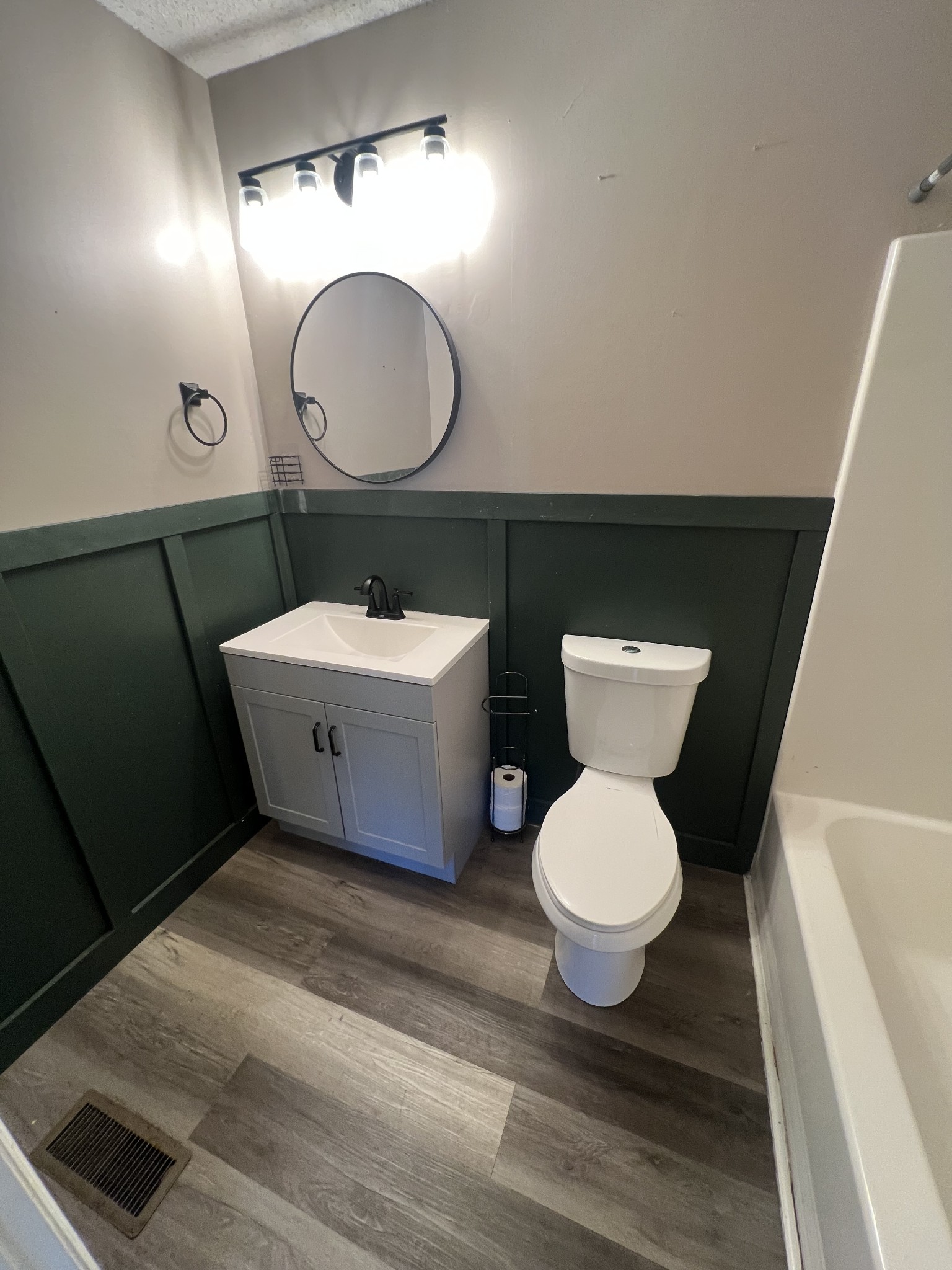 149 Hawthorne Street Pulaski, TN 38478 - Photo 18 of 33 a bathroom with a toilet sink and mirror