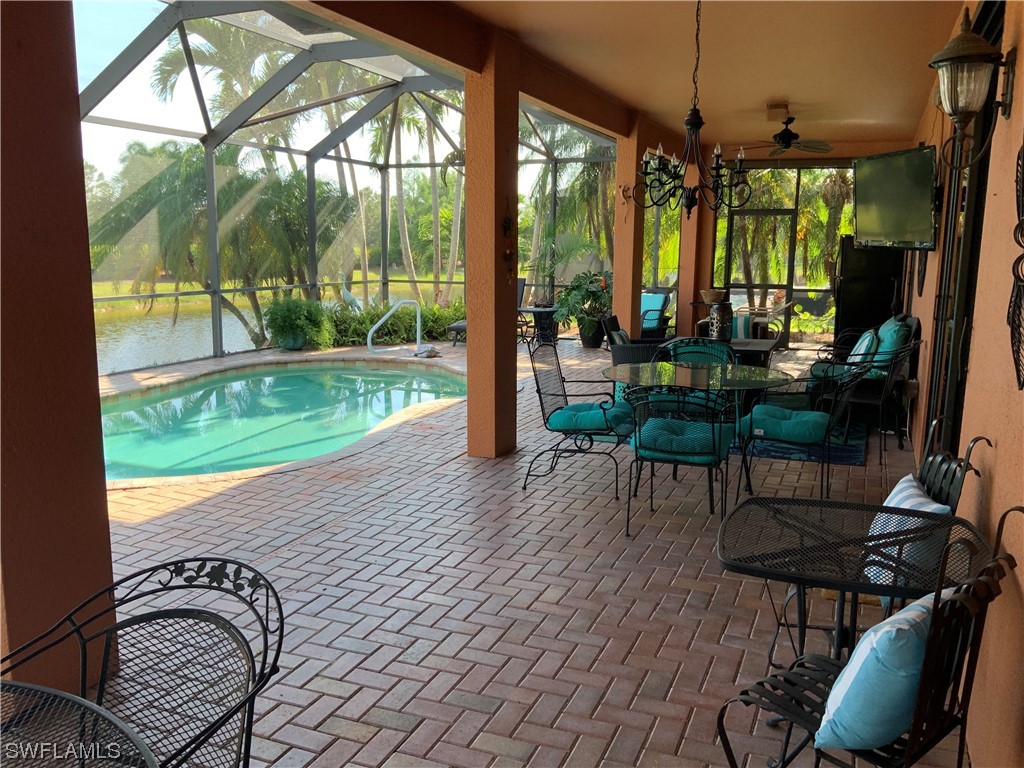 12918 Pastures Way Fort Myers, FL 33913 - Photo 11 of 34 a view of a porch with chairs and backyard