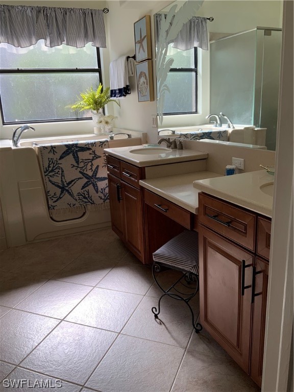 12918 Pastures Way Fort Myers, FL 33913 - Photo 26 of 34 a bathroom with a sink and a mirror