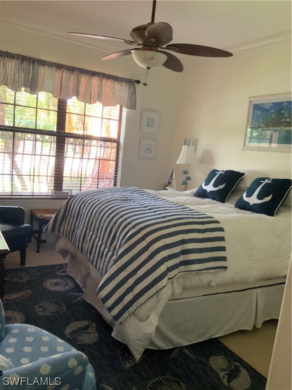 12918 Pastures Way Fort Myers, FL 33913 - Photo 28 of 34 a bedroom with a bed and a window