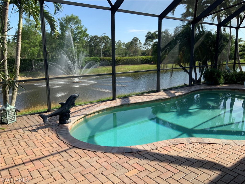 12918 Pastures Way Fort Myers, FL 33913 - Photo 10 of 34 a view of a swimming pool with a patio