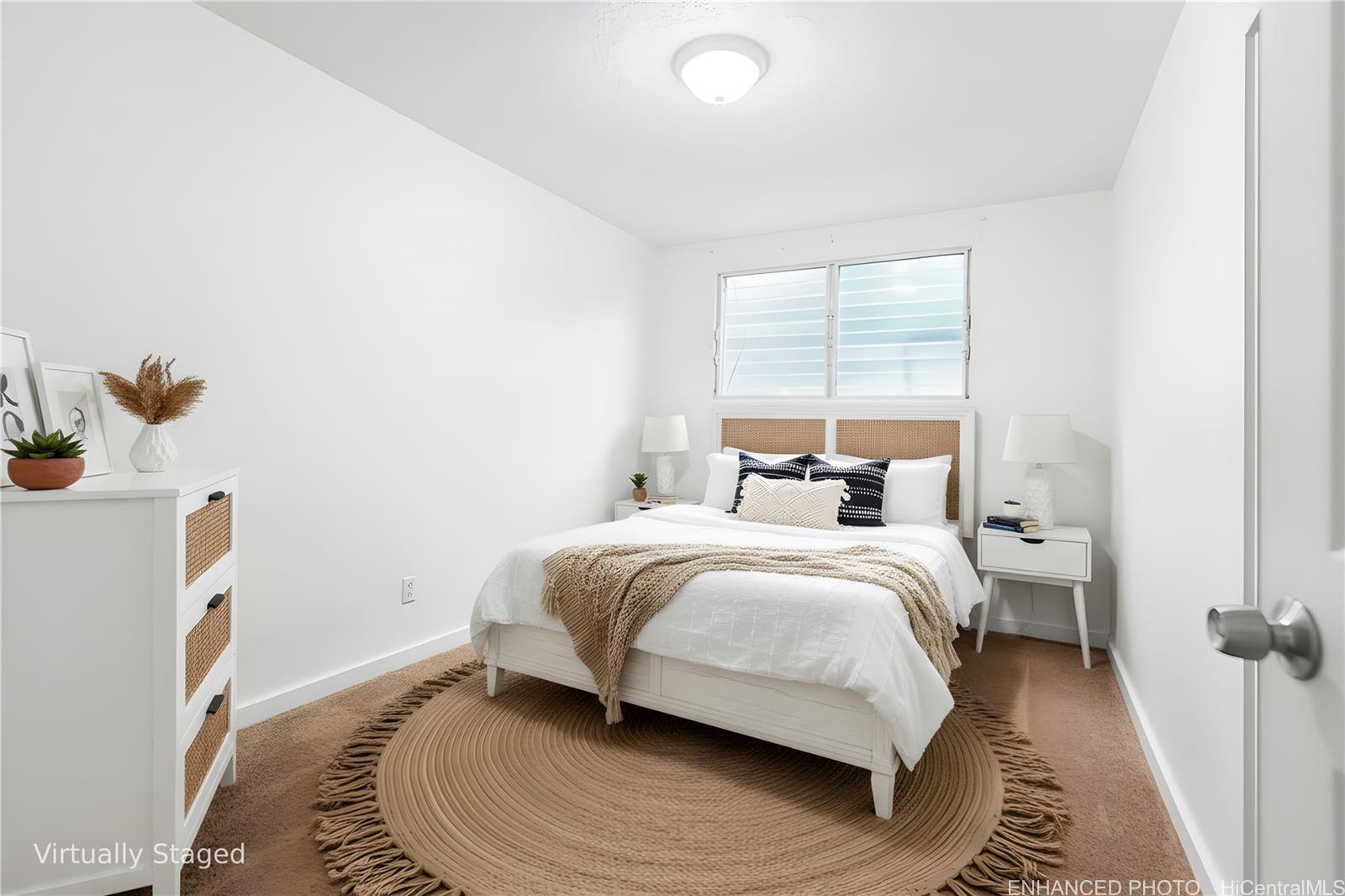 47-325 Ahuimanu Road Kaneohe, HI 96744 - Photo 11 of 24 a bed room with a bed and a window