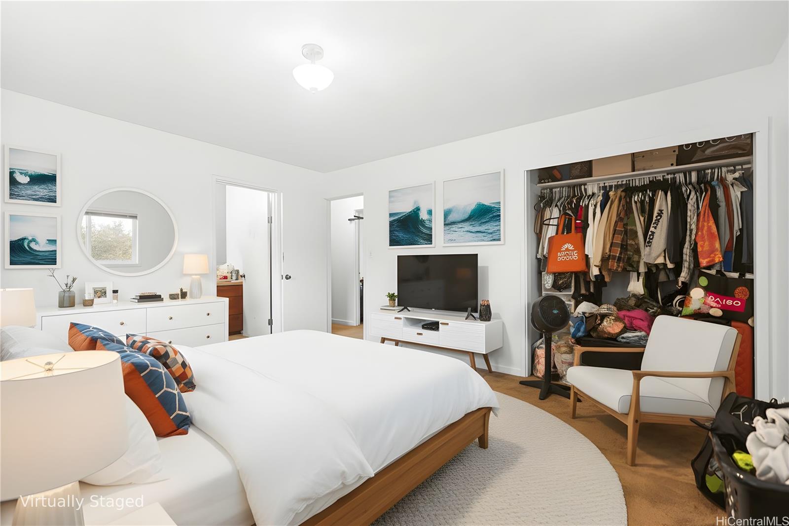 47-325 Ahuimanu Road Kaneohe, HI 96744 - Photo 16 of 24 a bedroom with a bed and a flat screen tv