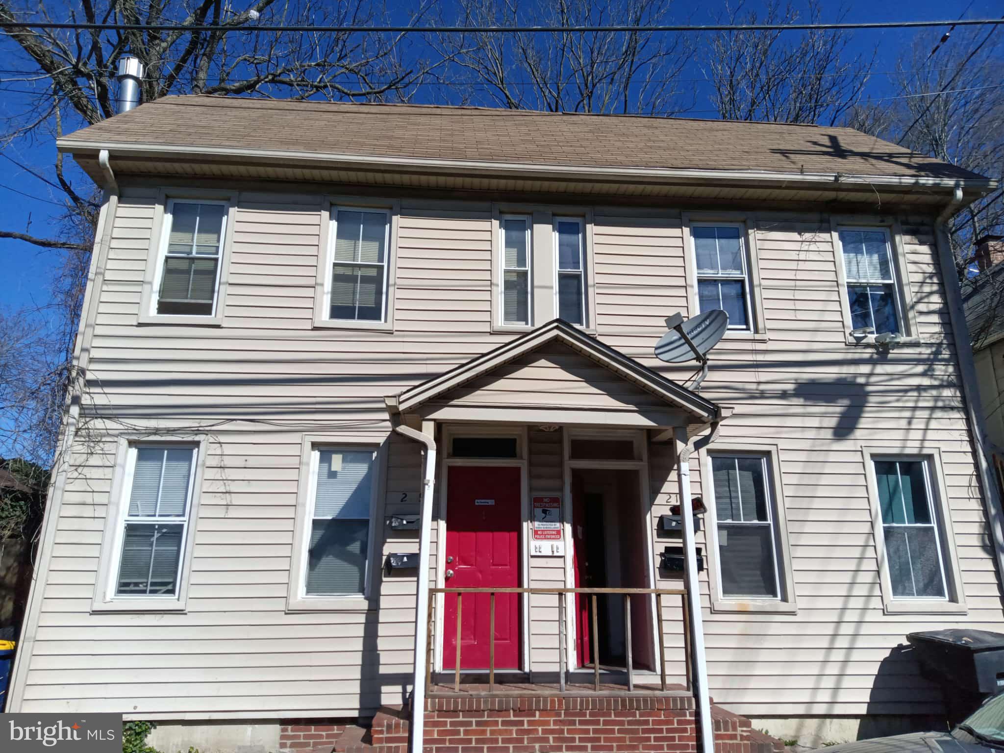 217-219 West Reed Street Dover, DE 19904 - Photo 1 of 40 a front view of a house
