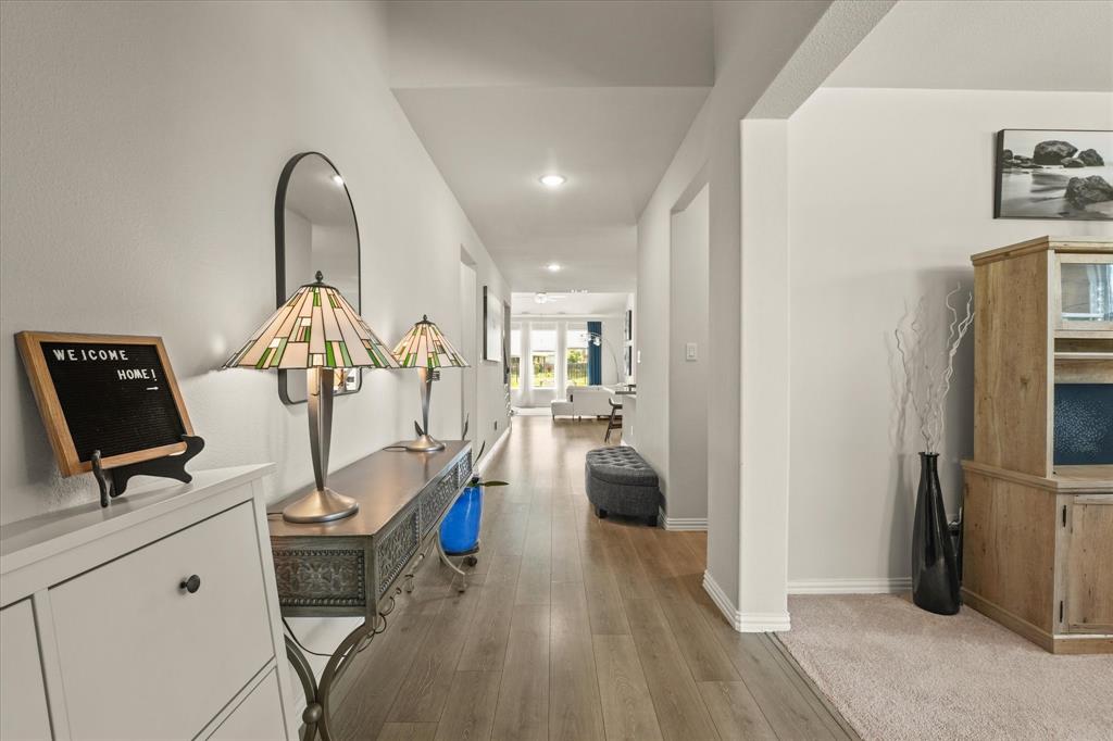 3217 Flowering Peach Dr. Heath, TX 75126 - Photo 5 of 30 a view of a workspace with furniture and a window
