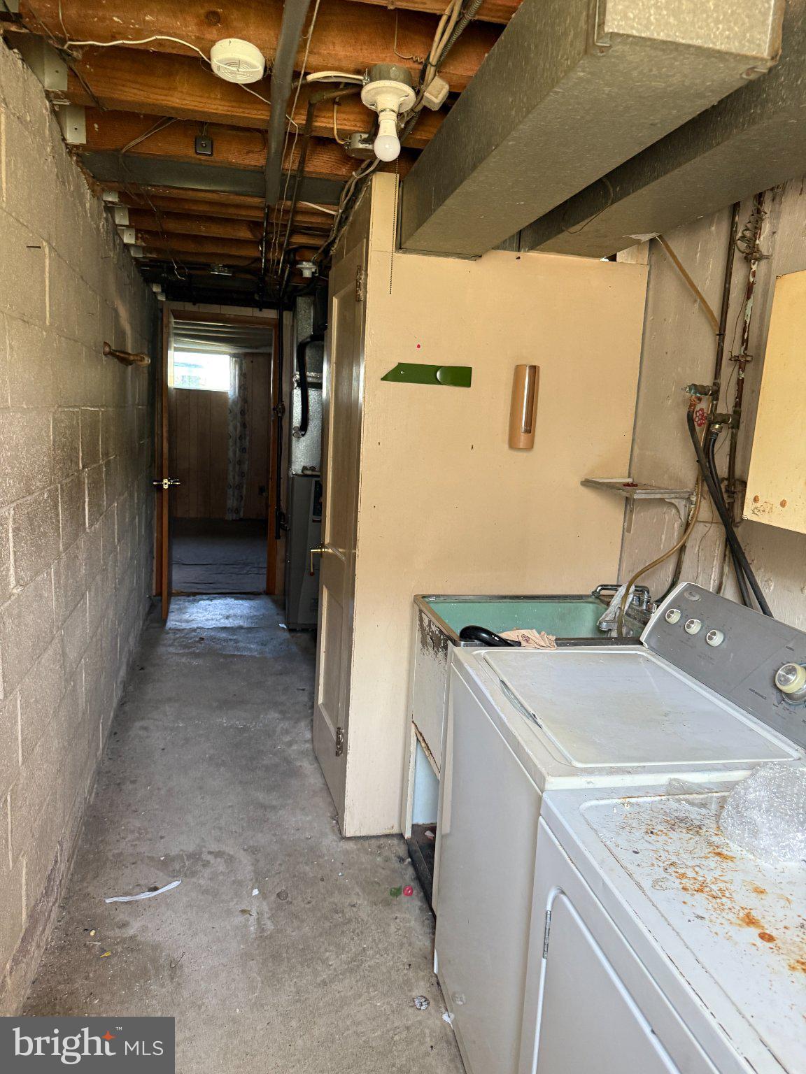 2142 Ripley Street Philadelphia, PA 19152 - Photo 14 of 14 Functional laundry space with potential.