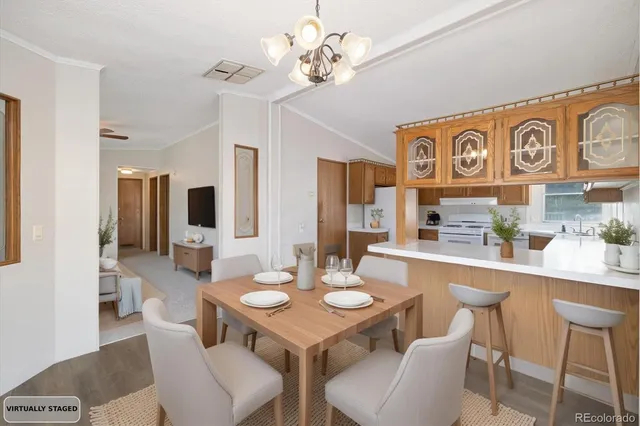 a view of a dining room with furniture