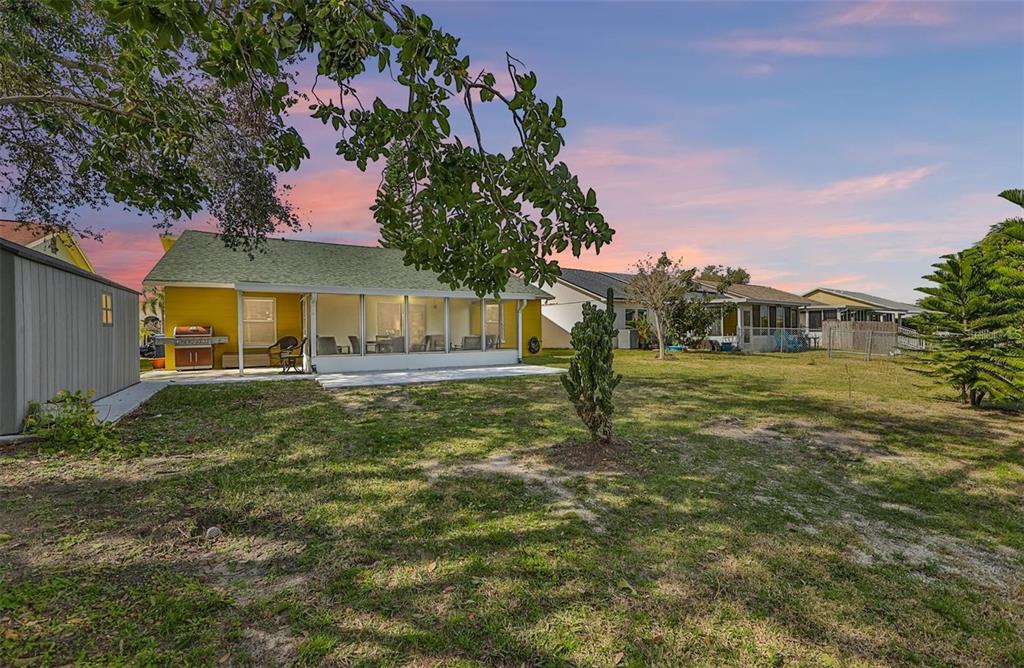 128 Lookout Drive Apollo Beach, FL 33572 - Photo 2 of 36 a front view of a house with garden