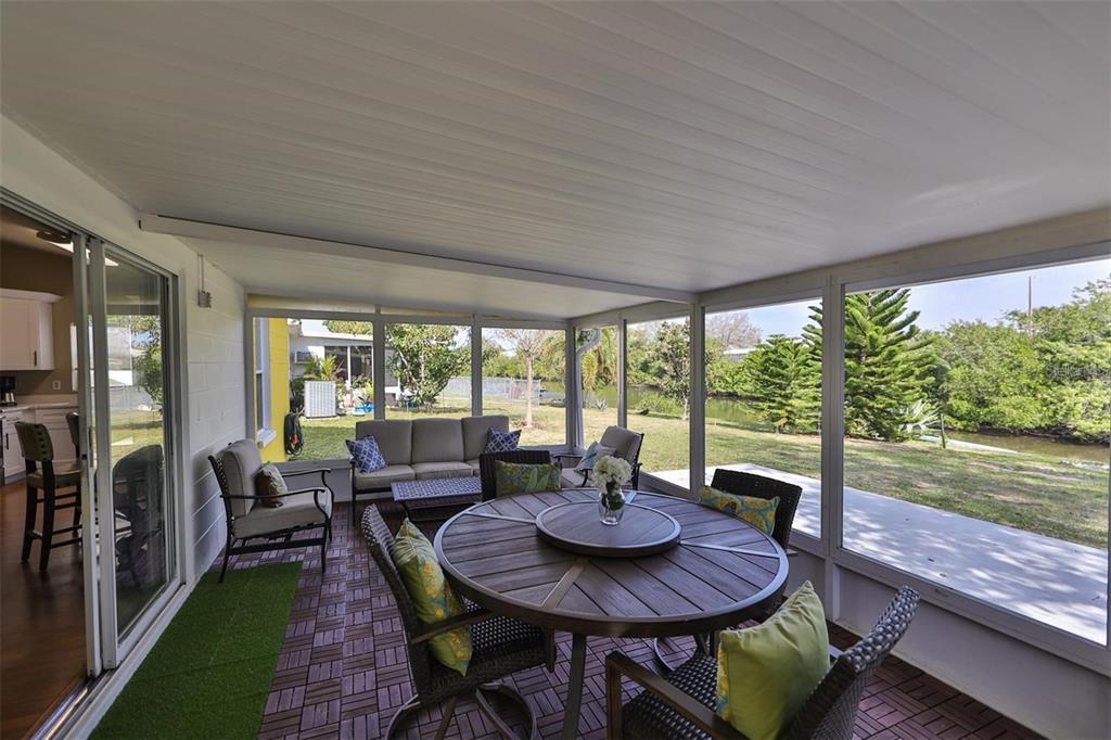 128 Lookout Drive Apollo Beach, FL 33572 - Photo 27 of 36 a view of a dining room with furniture window and outside view