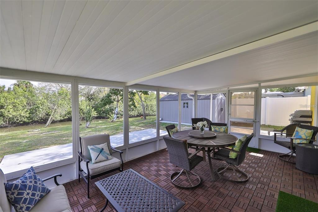 128 Lookout Drive Apollo Beach, FL 33572 - Photo 28 of 36 a dining room with furniture and wooden floor