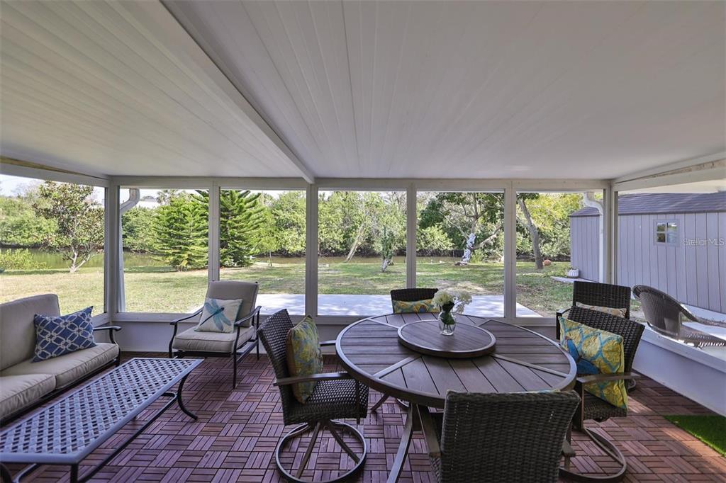 128 Lookout Drive Apollo Beach, FL 33572 - Photo 29 of 36 a view of a dining room with furniture window and outside view
