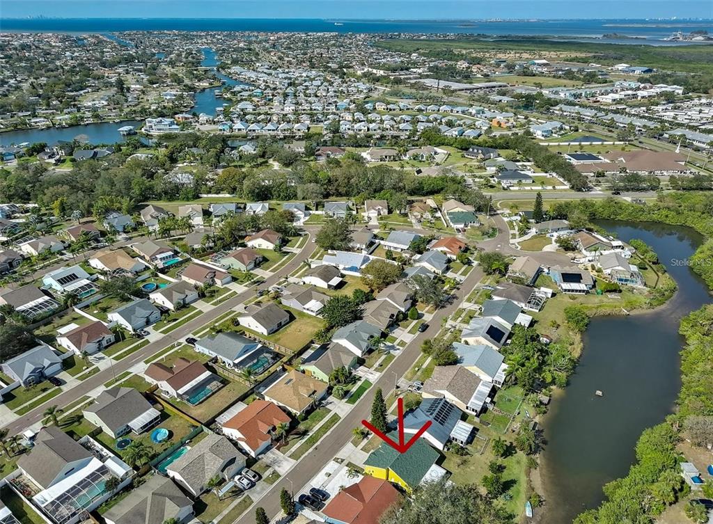 128 Lookout Drive Apollo Beach, FL 33572 - Photo 36 of 36 an aerial view of residential houses with outdoor space