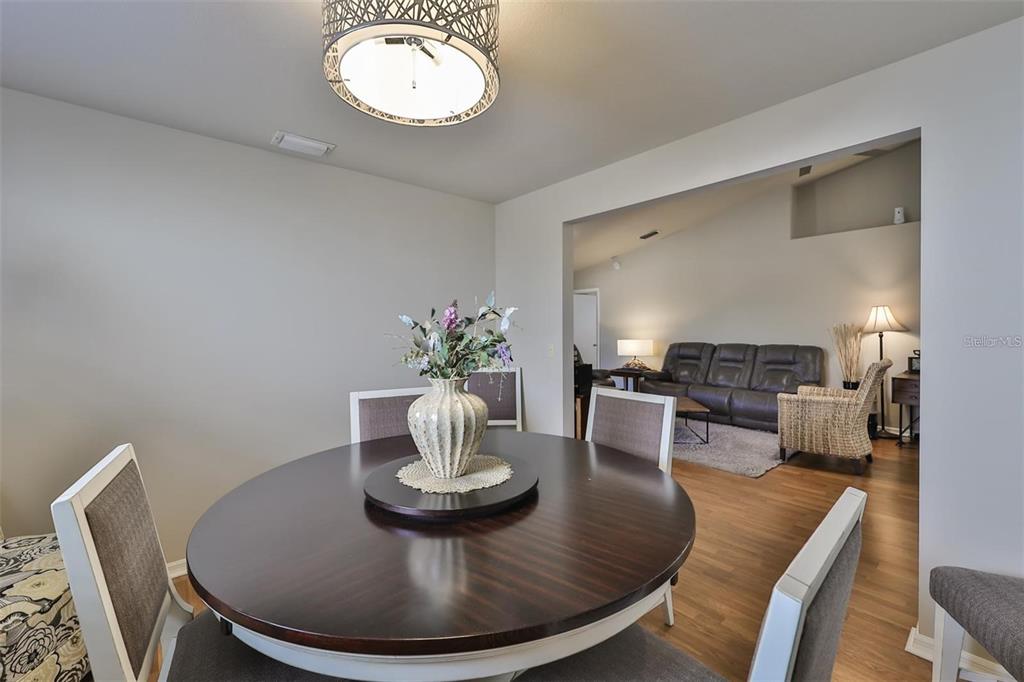 128 Lookout Drive Apollo Beach, FL 33572 - Photo 10 of 36 a view of a dining room with furniture