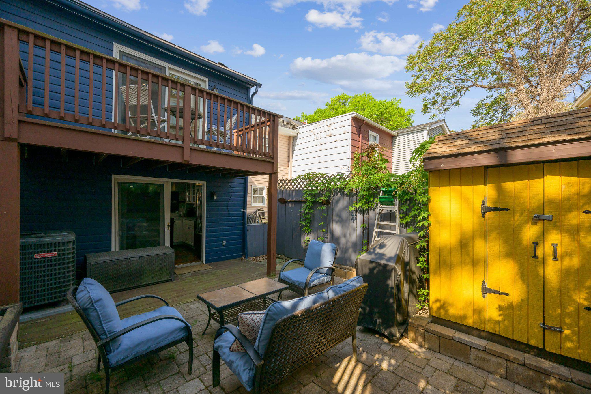 24 Fleet Street Annapolis, MD 21401 - Photo 22 of 32 a view of a patio with table and chairs with wooden floor and fence