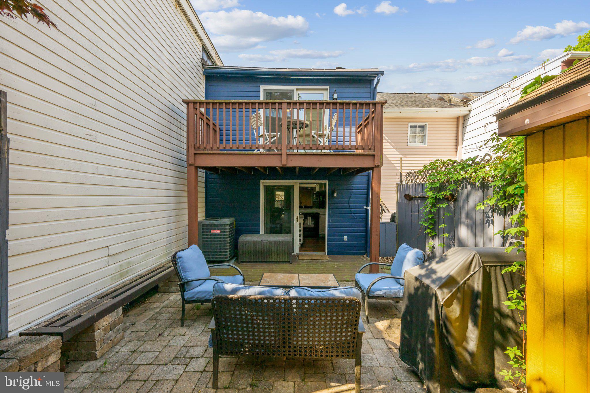 24 Fleet Street Annapolis, MD 21401 - Photo 23 of 32 a view of a chair and tables in the patio