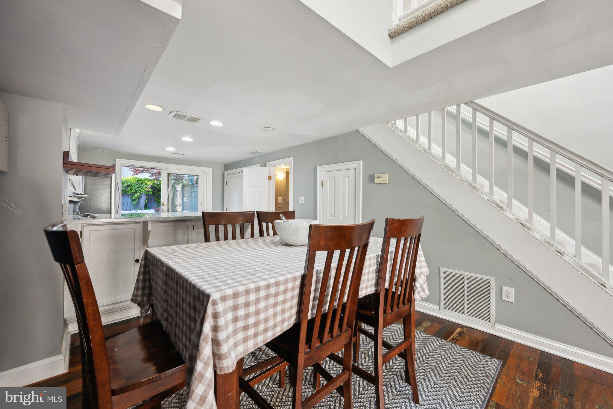 24 Fleet Street Annapolis, MD 21401 - Photo 3 of 32 a view of a dining room with furniture and wooden floor