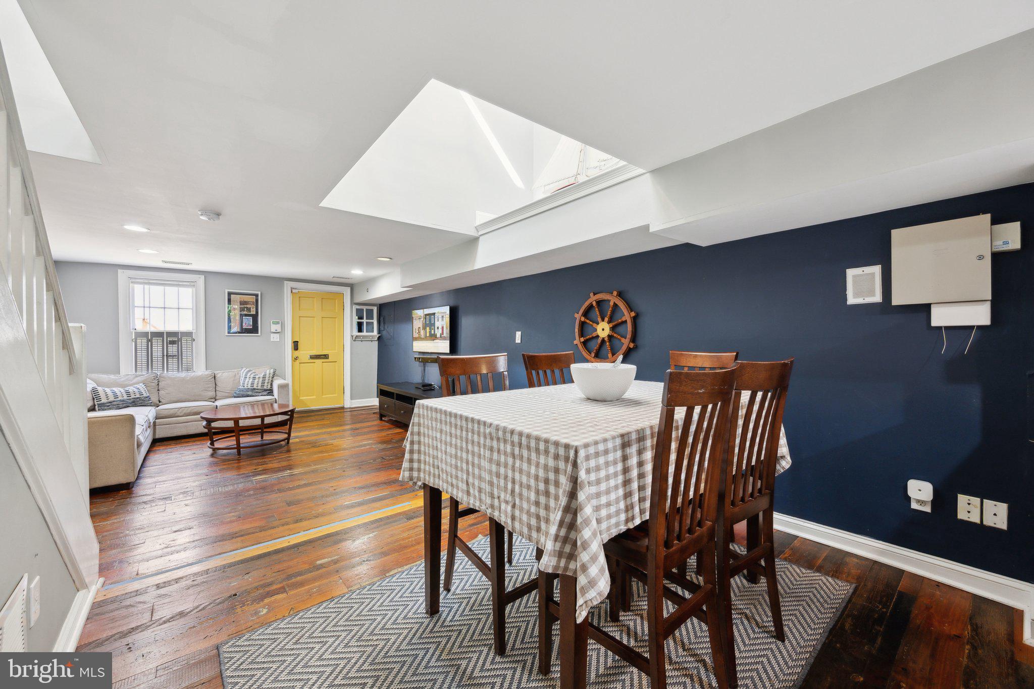 24 Fleet Street Annapolis, MD 21401 - Photo 4 of 32 a view of a dining room with furniture and wooden floor