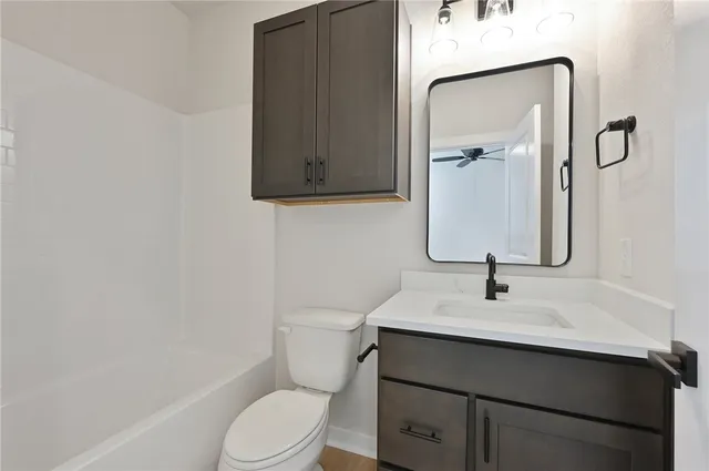 an empty room with a bathroom