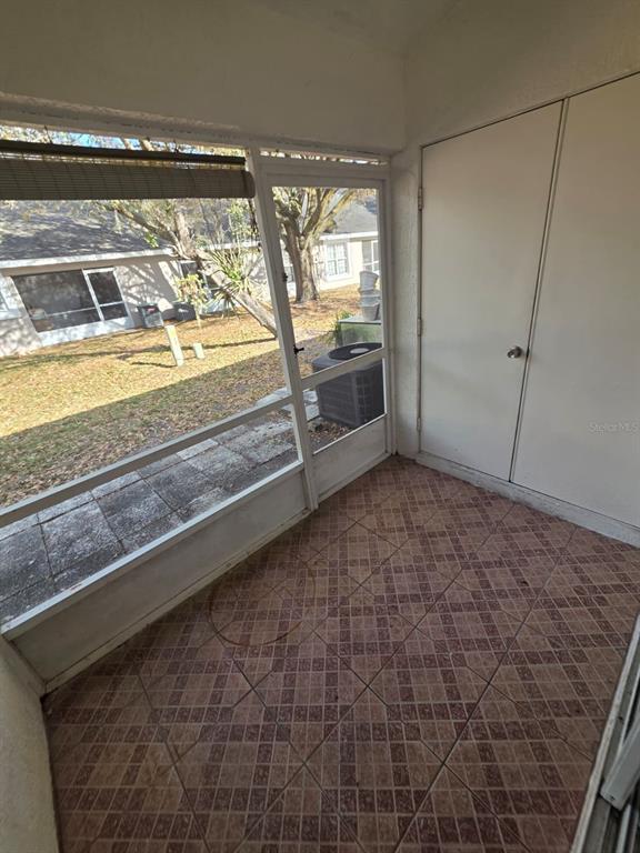 2358 Water View Loop Kissimmee, FL 34743 - Photo 17 of 26 a view of an empty room and window