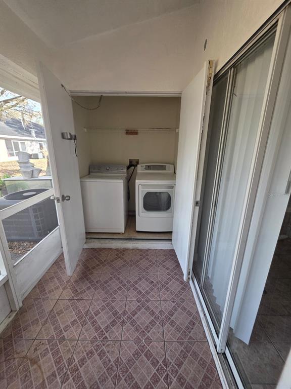 2358 Water View Loop Kissimmee, FL 34743 - Photo 18 of 26 a view of an empty room with a window