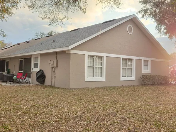 a front view of a house with garage
