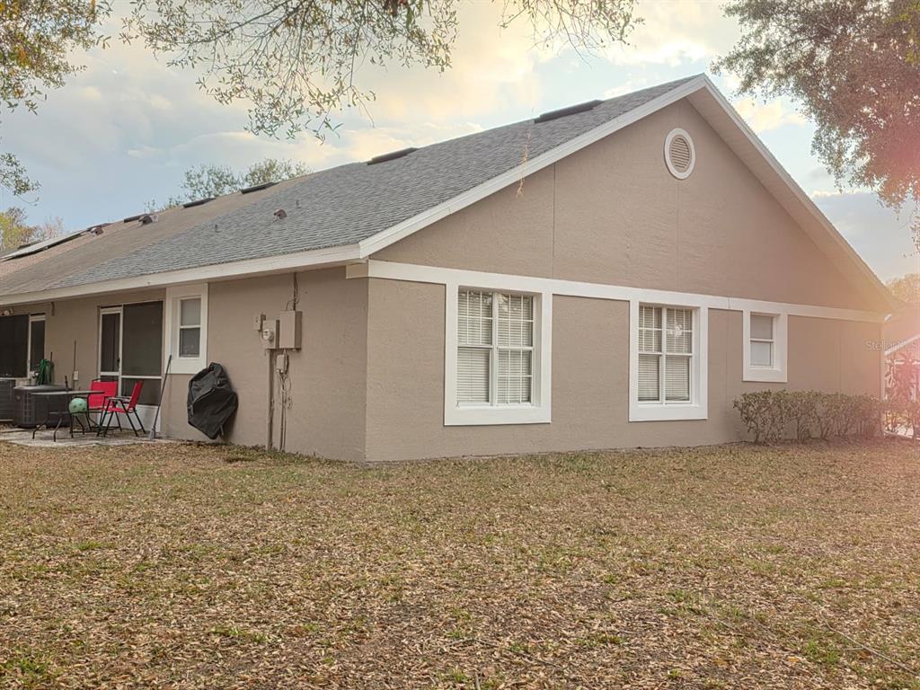 2358 Water View Loop Kissimmee, FL 34743 - Photo 3 of 26 a front view of a house with garage