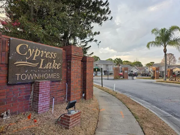 a view of a street with a building on both side of street
