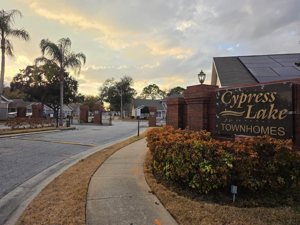 2358 Water View Loop Kissimmee, FL 34743 - Photo 5 of 26 a view of a street with a building on both side of street