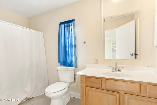 a view of a chairs and table in the roof deck