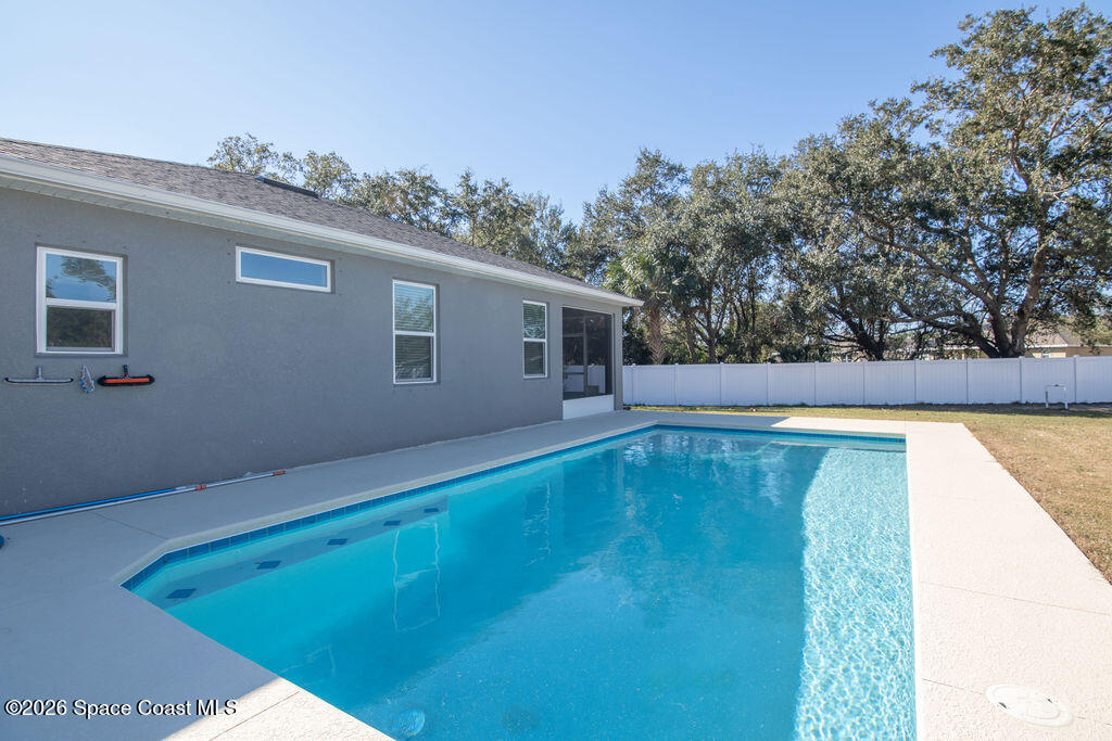 200 Triana Avenue Southwest Palm Bay, FL 32908 - Photo 25 of 27 a view of a mini pool with an outdoor space