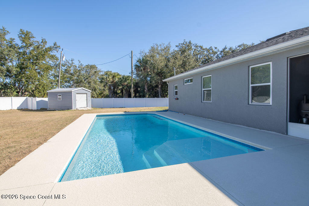 200 Triana Avenue Southwest Palm Bay, FL 32908 - Photo 3 of 27 a view of an outdoor space and a yard