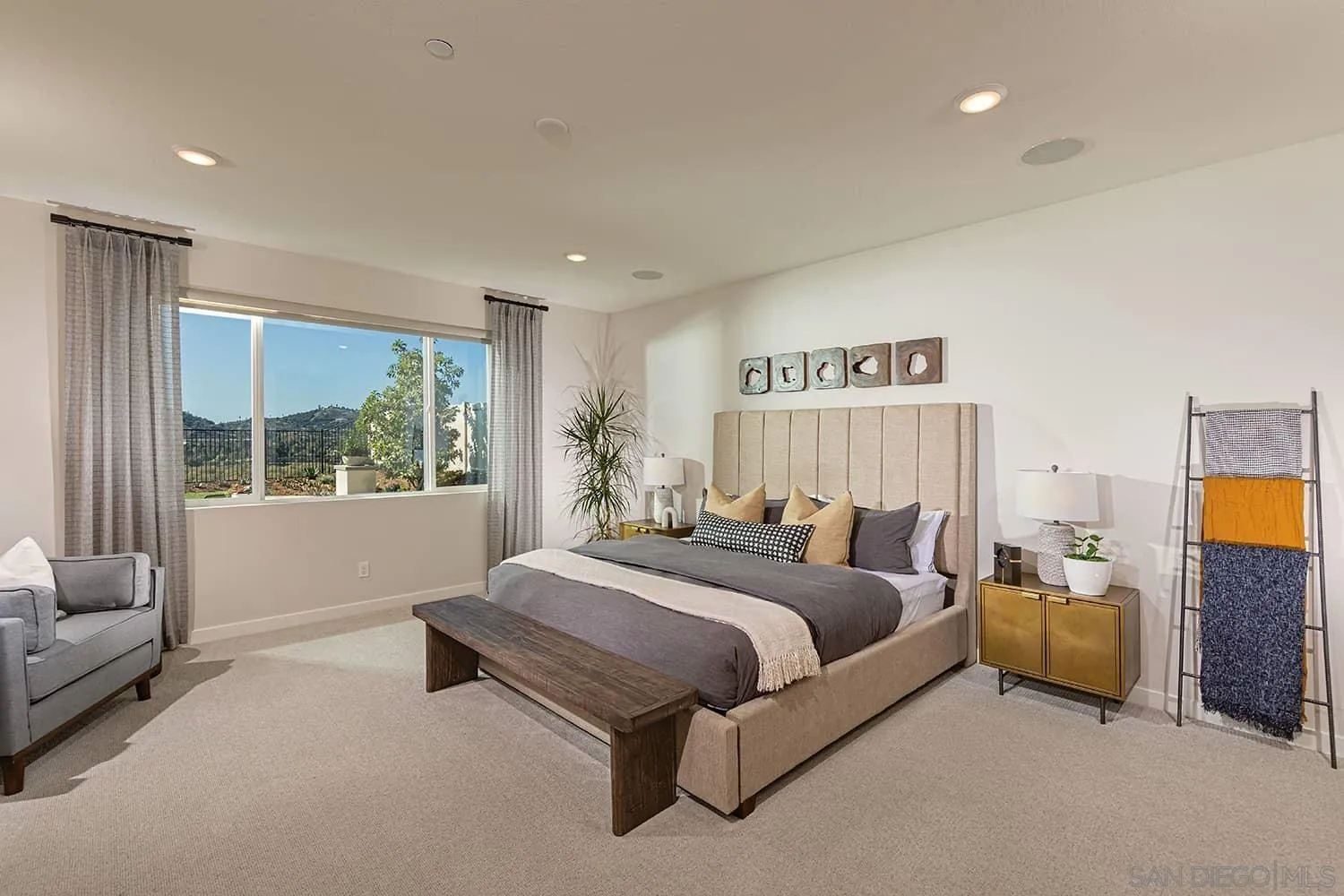 35104 Cooper Place, Unit 106 Fallbrook, CA 92028 - Photo 5 of 13 a bedroom with bed and glass window