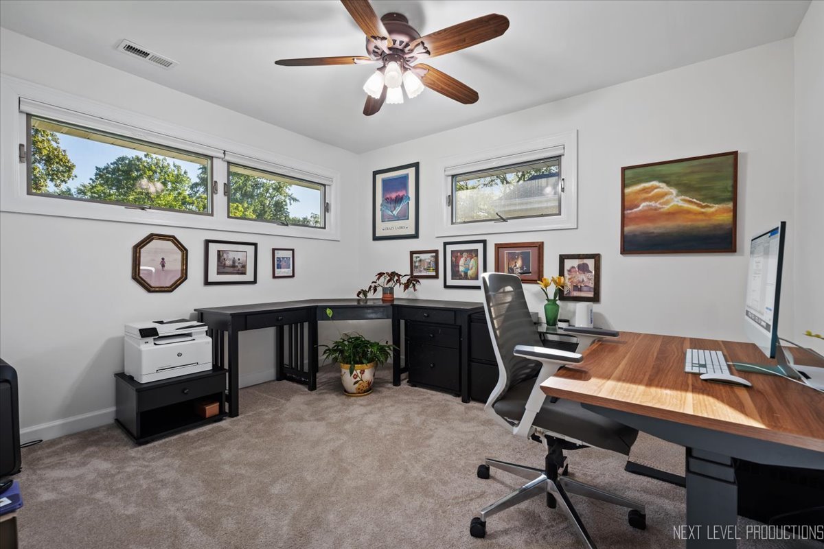 703 Wakeman Avenue Wheaton, IL 60187 - Photo 17 of 20 a view of a workspace with furniture