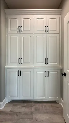 a view of a house with wooden deck