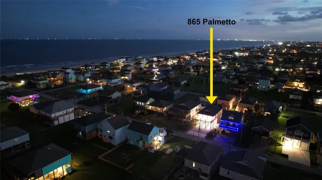 a view of gallery with wooden floor