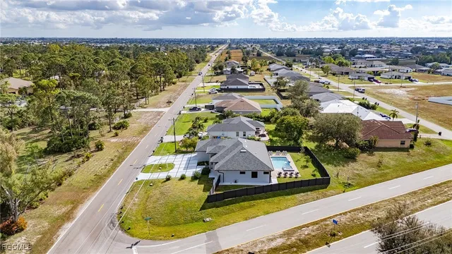 a view of a house with swimming pool