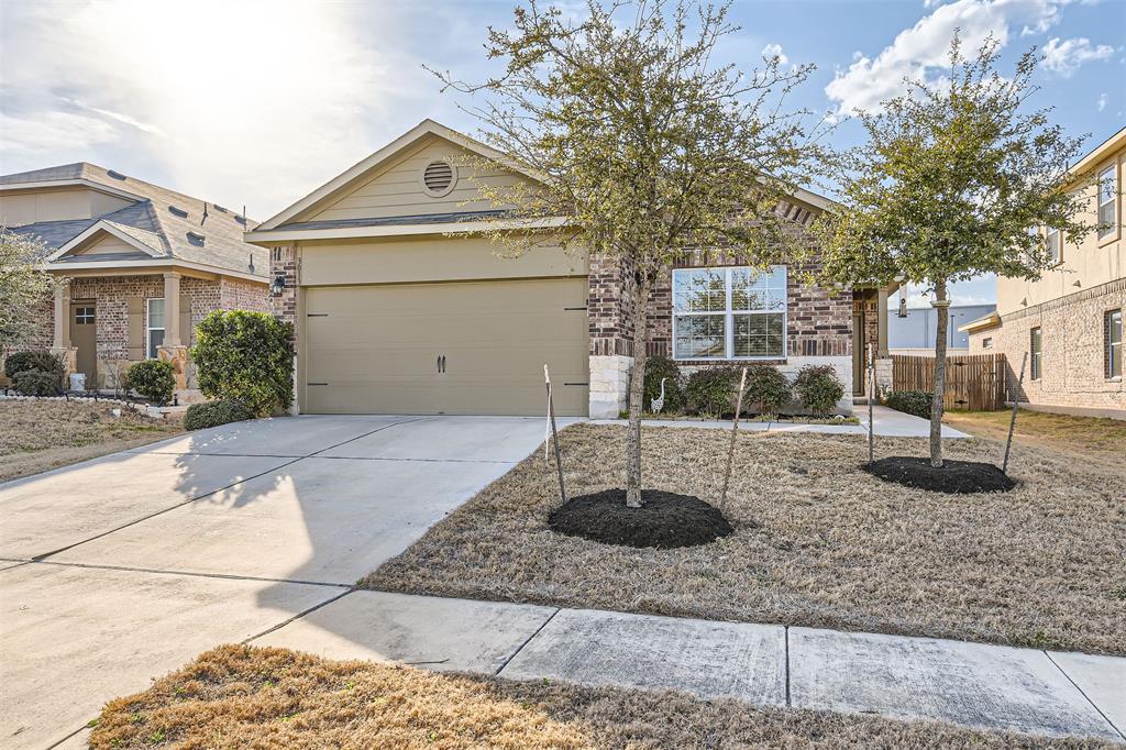 3013 Blantyre Bend Round Rock, TX 78664 - Photo 2 of 20 a front view of a house with entertaining space