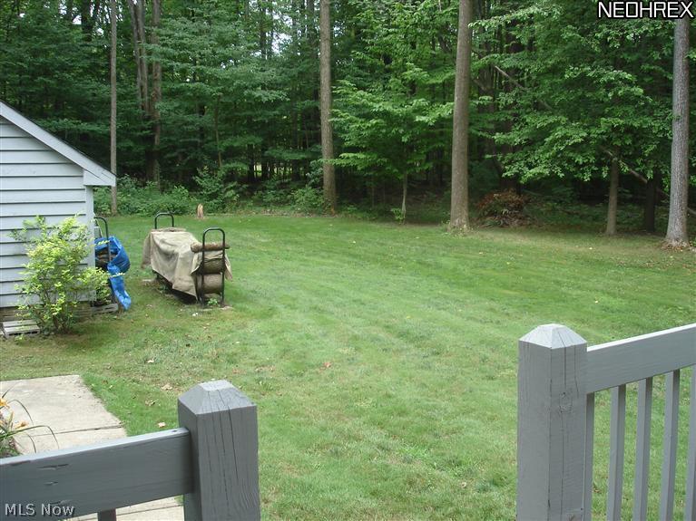 16532 Haskins Road Bainbridge, OH 44023 - Photo 16 of 19 VIEW OF TOOLSHED, BACKYARD AND WOODS FROM THE DECK