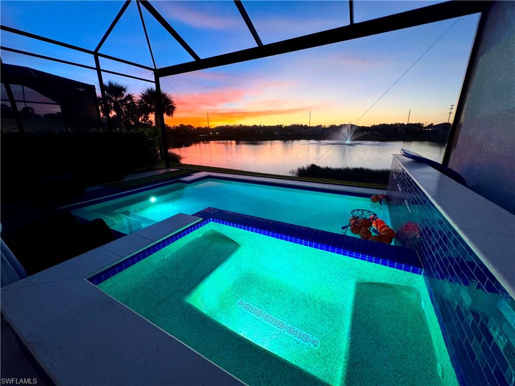 14605 Kingfisher Loop Naples, FL 34120 - Photo 35 of 42 a view of swimming pool from a balcony