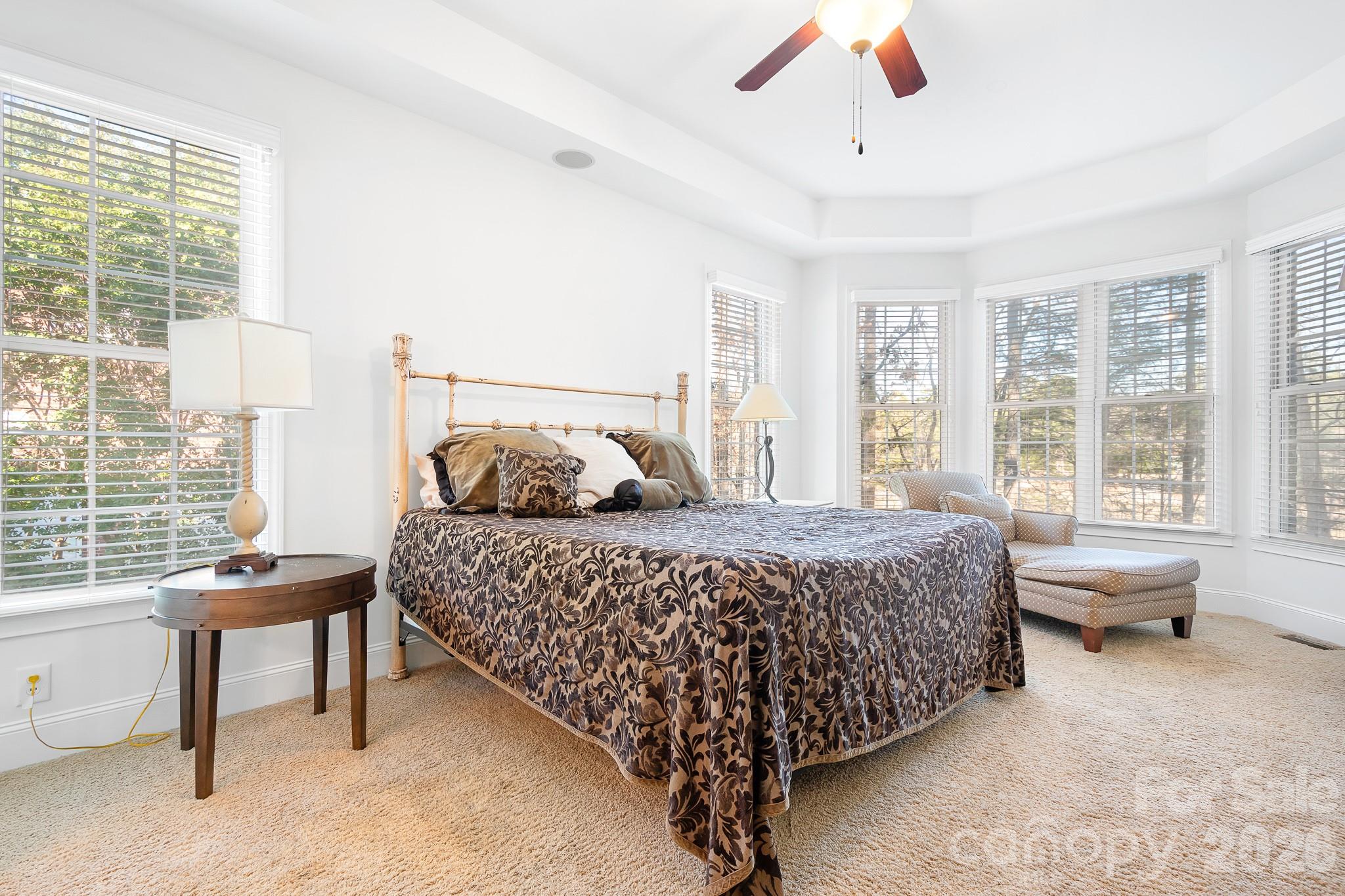 214 Lytham Lane Stanley, NC 28164 - Photo 18 of 46 a bedroom with a bed and a large window
