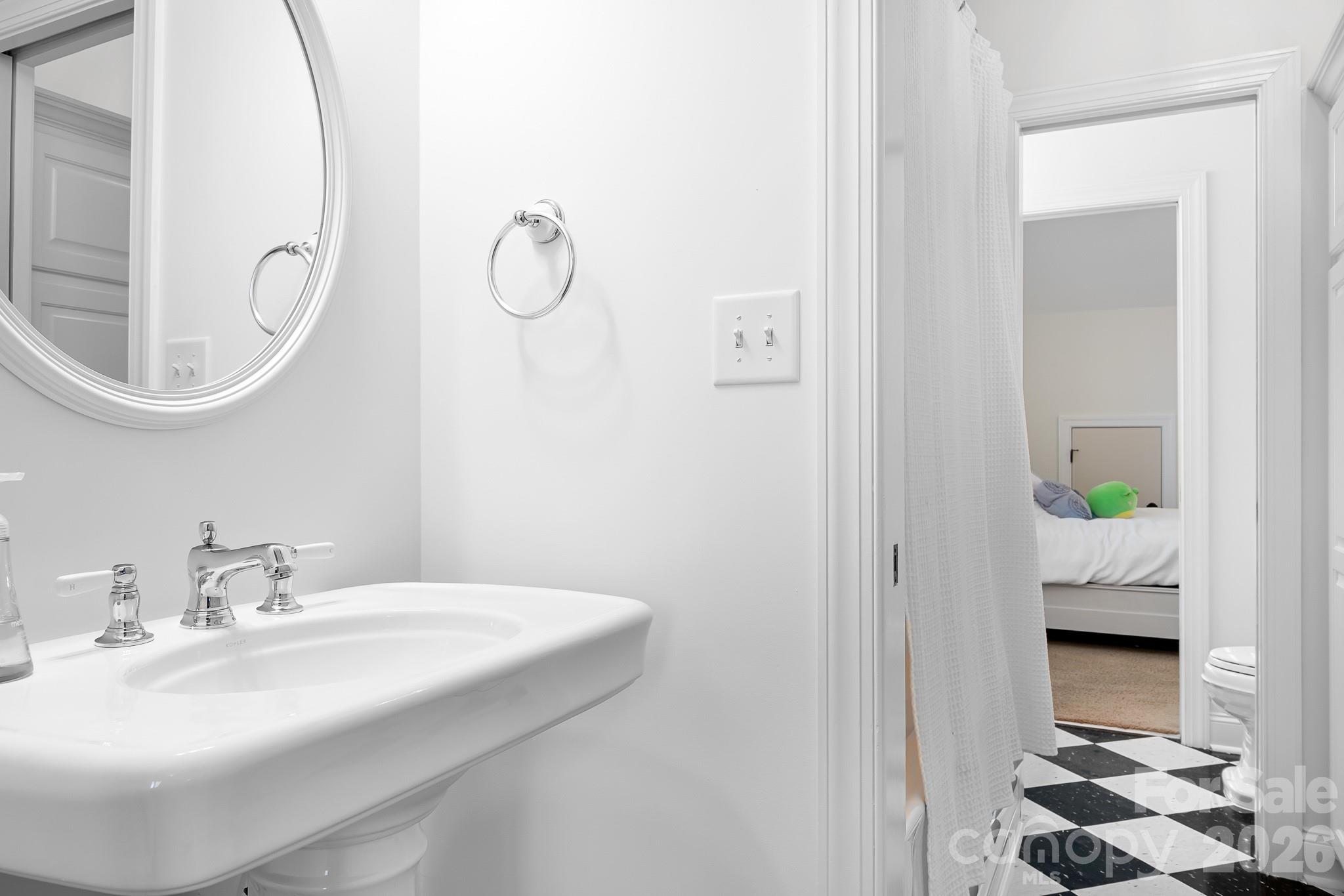 214 Lytham Lane Stanley, NC 28164 - Photo 21 of 46 a bathroom with a sink and a mirror