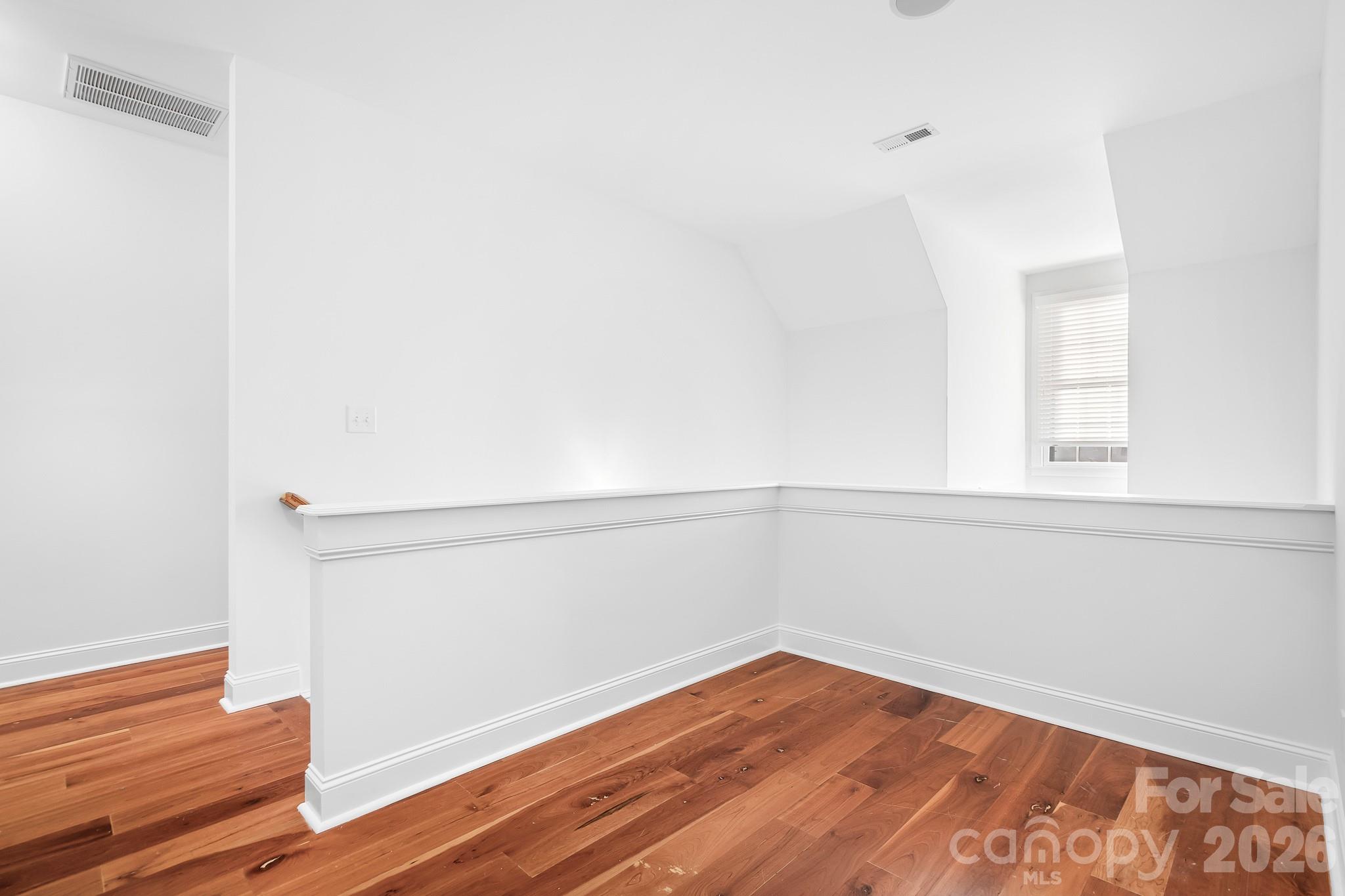 214 Lytham Lane Stanley, NC 28164 - Photo 27 of 46 a view of a room with wooden floor