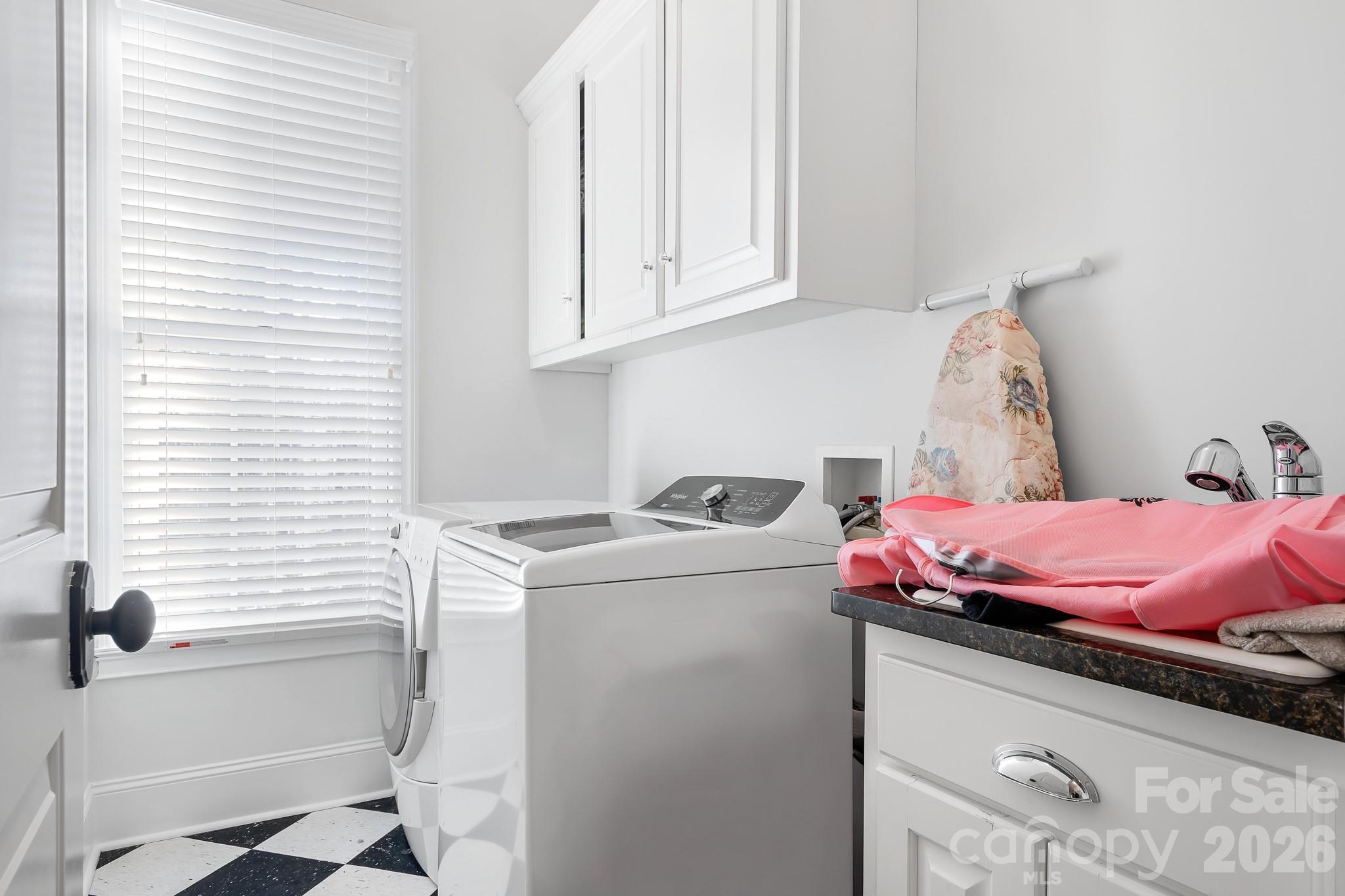 214 Lytham Lane Stanley, NC 28164 - Photo 28 of 46 a bathroom with a granite countertop sink and a toilet
